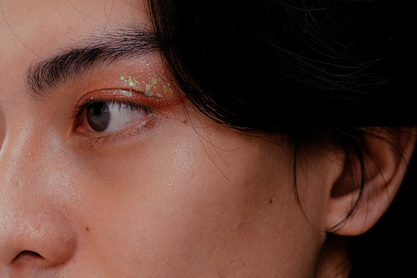 Closeup Portrait of a Man with Eye Makeup